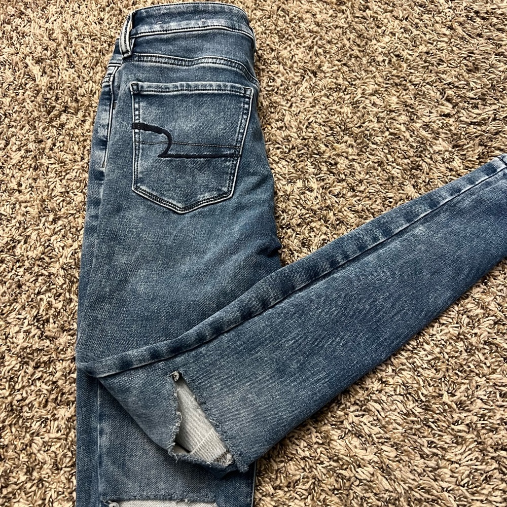 AE distressed ripped jeggings